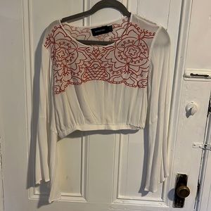 Cropped long sleeve top